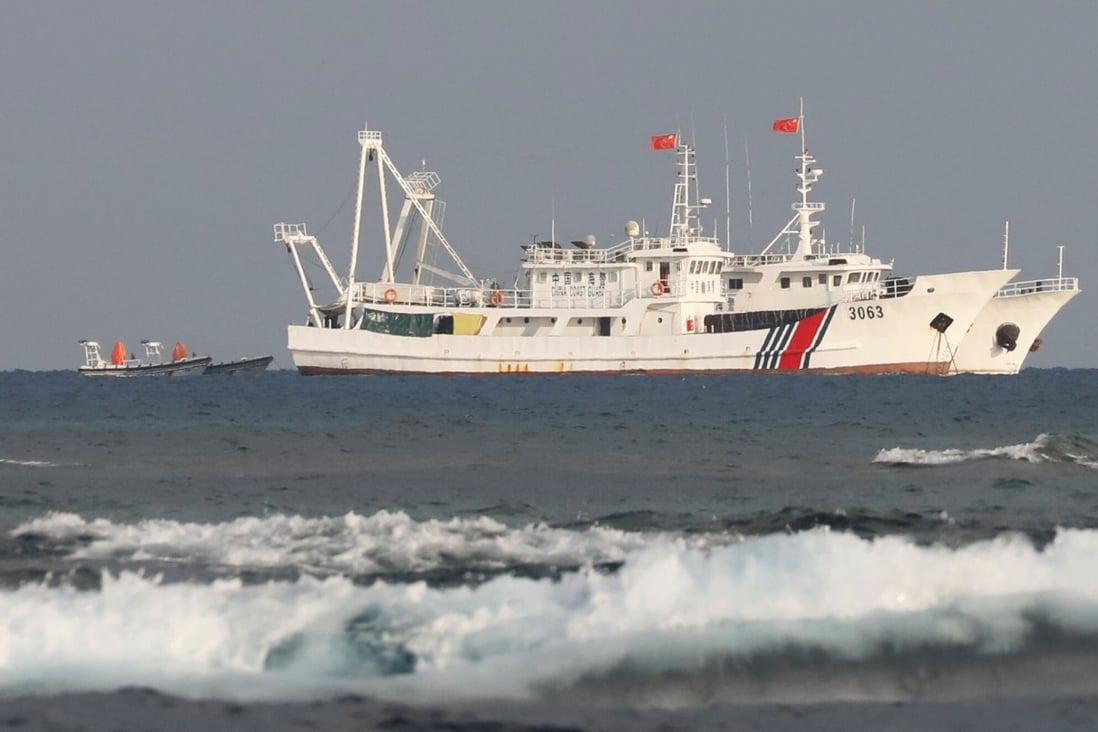 China coastguard vessels are pictured at the disputed Scarborough Shoal in 2017. Photo: Reuters