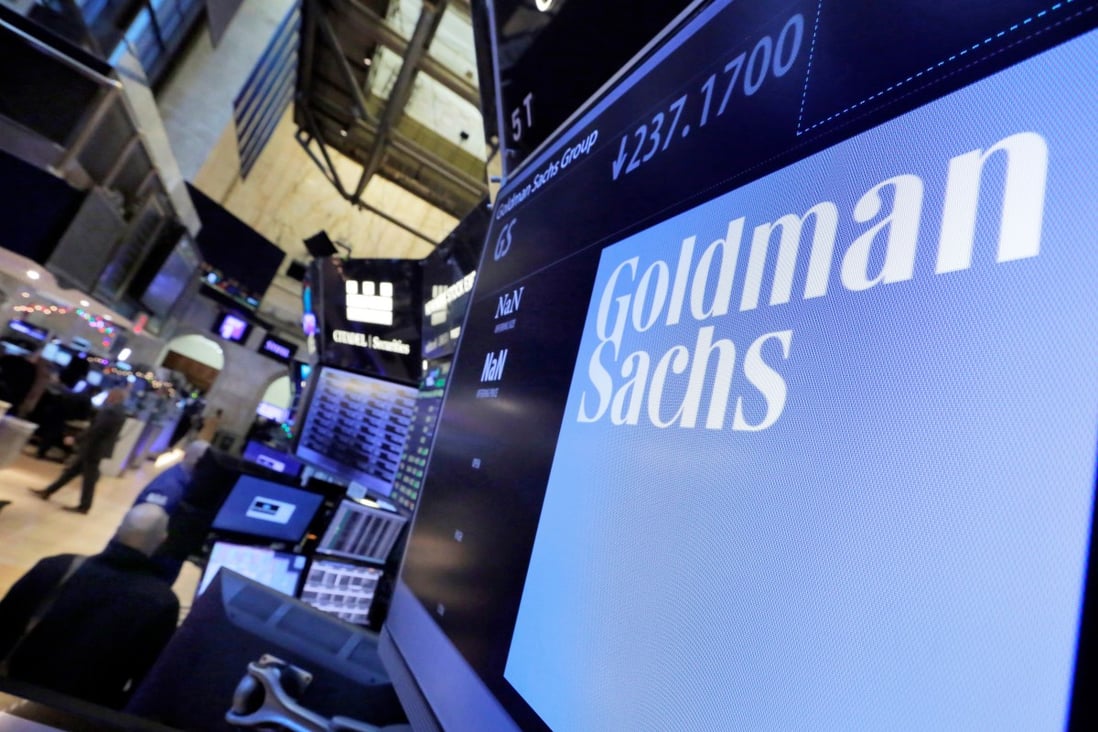 Goldman Sachs’ logo appears above a trading post on the floor of the New York Stock Exchange on December 13, 2016. Photo: AP