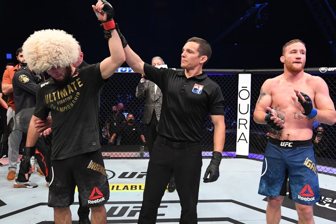 Khabib Nurmagomedov celebrates his victory over Justin Gaethje in their lightweight title bout at the UFC 254 on Fight Island in Abu Dhabi. Photos: Josh Hedges/Zuffa LLC via Getty Images