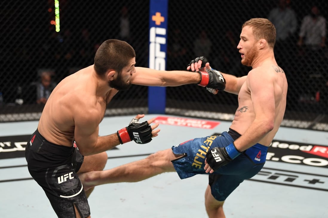 Justin Gaethje kicks Khabib Nurmagomedov in their lightweight title bout during UFC 254. Photo: Josh Hedges/Zuffa LLC via Getty Images