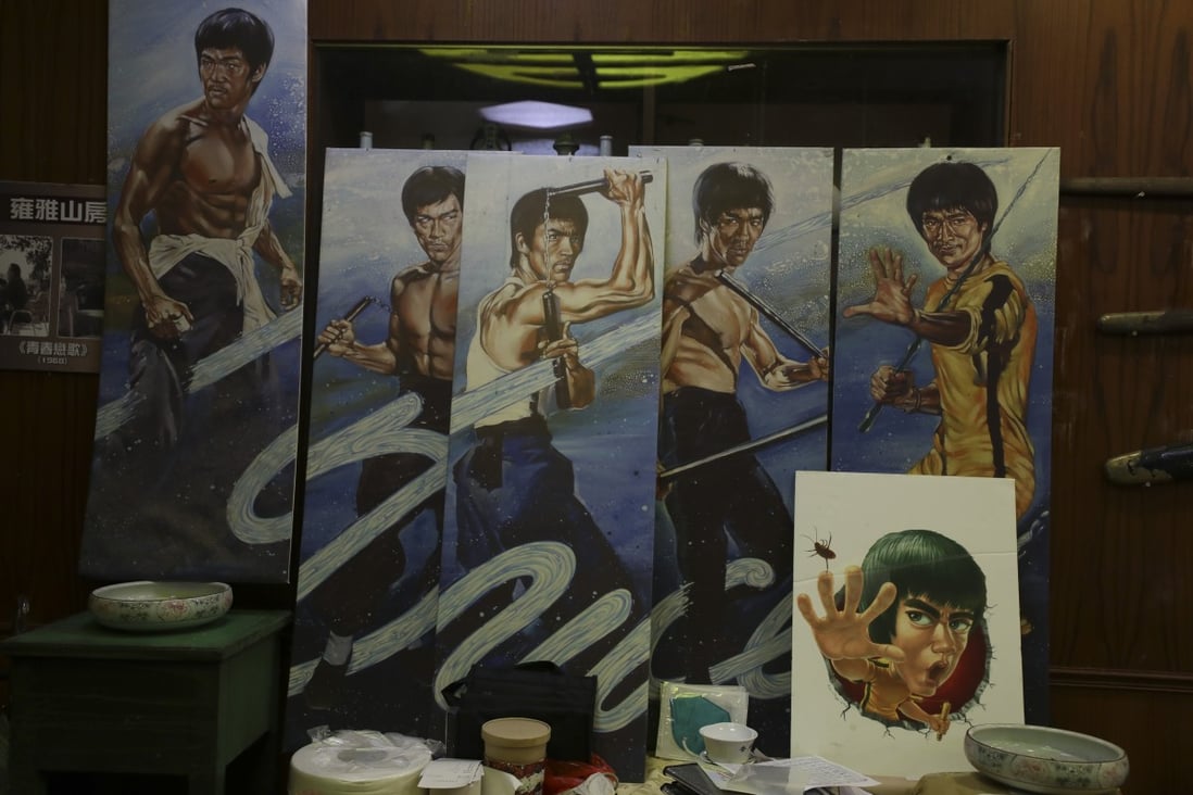 Paintings of Bruce Lee in all his glory adorn the walls of the Lung Wah Hotel in Sha Tin, Hong Kong. Martial arts film star Lee was once a regular customer. Photo: Xiaomei Chen