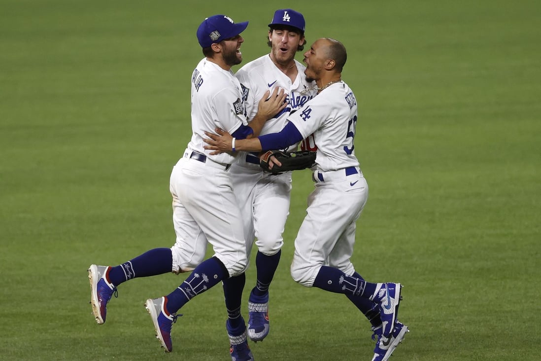 Los Angeles Dodgers players Chris Taylor, Cody Bellinger and Mookie Betts celebrate after defeating the Tampa Bay Rays in Major League Baseball’s 2020 World Series. Photo: EPA