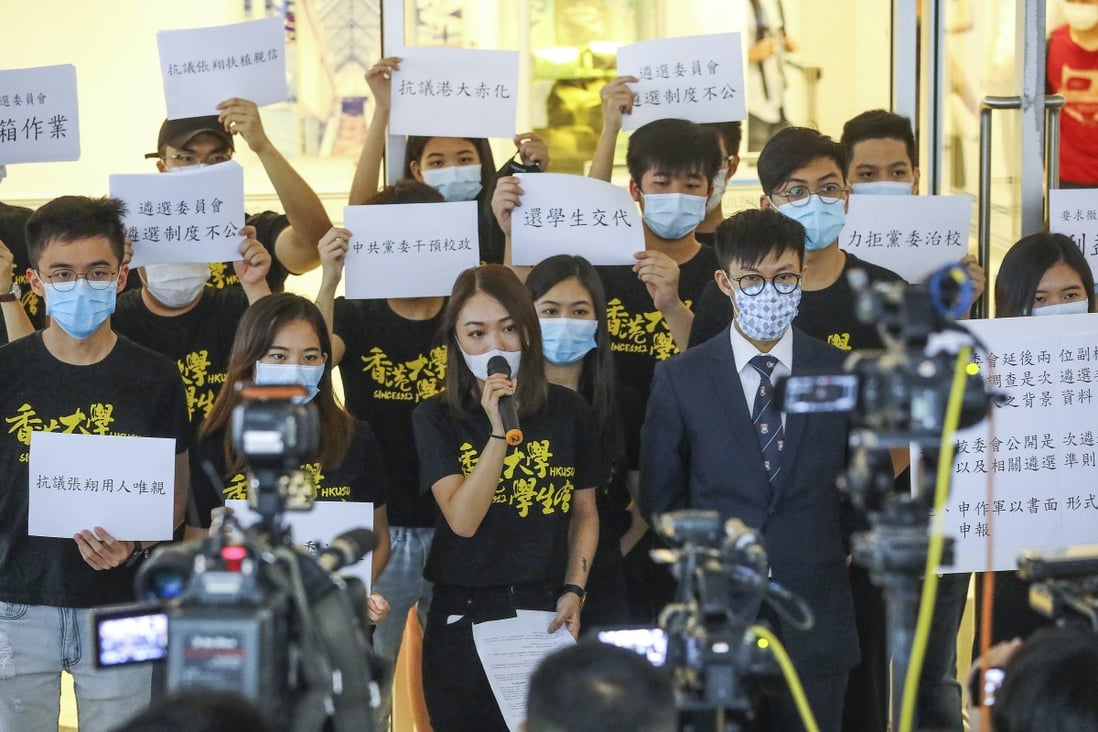 Members of the HKU student union present a petition against the hiring of two new vice-presidents with ties to mainland universities. Photo: Dickson Lee