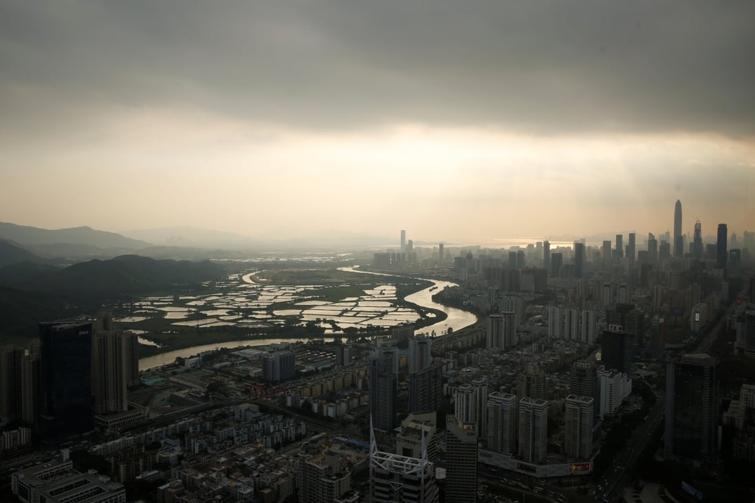 The Shenzhen River dividing Hong Kong from Shenzhen. “One country, two systems” was designed to keep Hong Kong’s “well water” from mixing with the mainland’s “river water”. Thus, allowing Hongkongers to vote from the mainland raises complicated political questions. Photo: Reuters