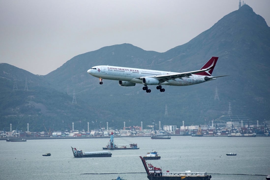A Cathay Dragon flight approaches for landing at Hong Kong International Airport on August 14 last year. Cathay Pacific shut down its subsidiary carrier as part of a massive restructuring. Photo: EPA-EFE