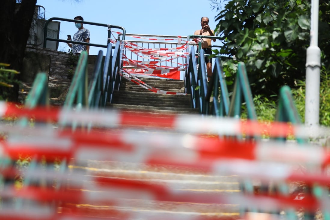 Stairs to the beach cordoned off at Clear Water Bay in July. All gazetted beaches in Hong Kong will reopen on November 3, but barbecue sites within them will remain closed. Photo: Dickson Lee