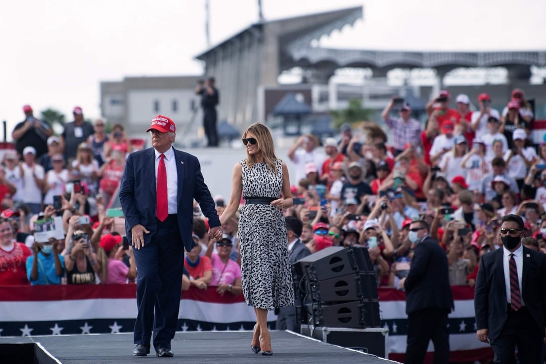 US President Donald Trump and first lady Melania Trump leave after speaking at a rally on Thursday in Tampa, Florida. Photo: AFP