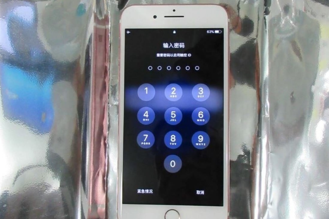 Meng Wanzhou's Apple iPhone that was seized at Vancouver's airport on December 1, 2018. It is seen resting on a Mylar bag, designed to prevent its contents from being remotely wiped or altered. Photo: BC Supreme Court exhibit