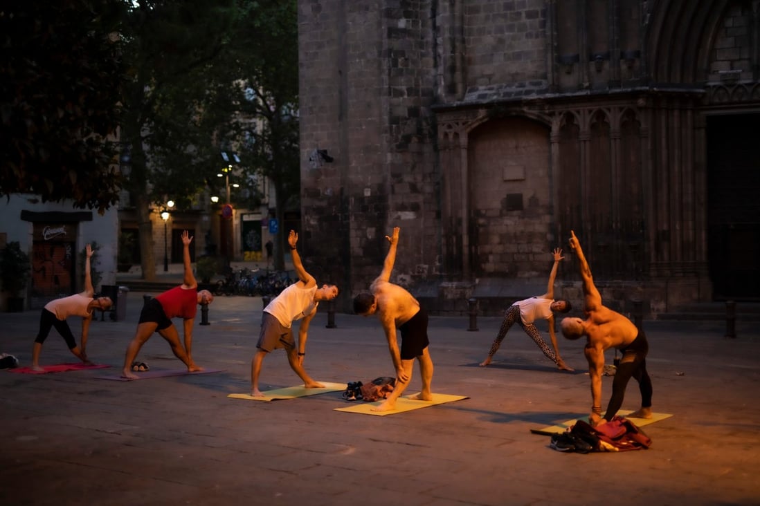 A yoga session in Barcelona’s deserted Gothic Quarter. Photo: Matilde Gattoni