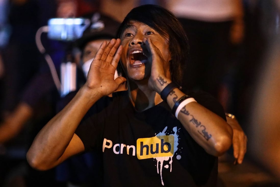 A pro-democracy protester shouts during a demonstration at the Ministry of Digital Economy and Society in Bangkok after the ministry blocked the Pornhub website. Photo: AFP