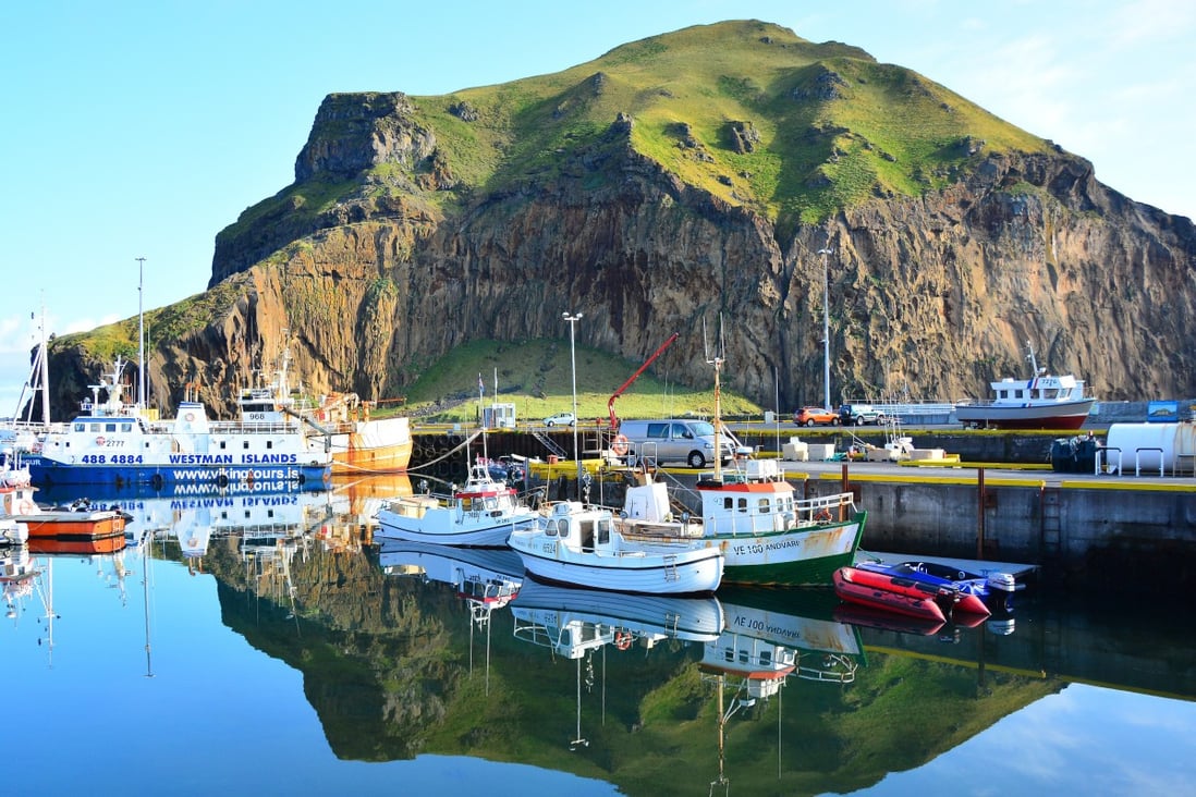 The harbour at Heimaey in Iceland – one of many small island getaways, albeit not tropical or desert. The local delicacy is stuffed puffin breast. Photo: Shutterstock