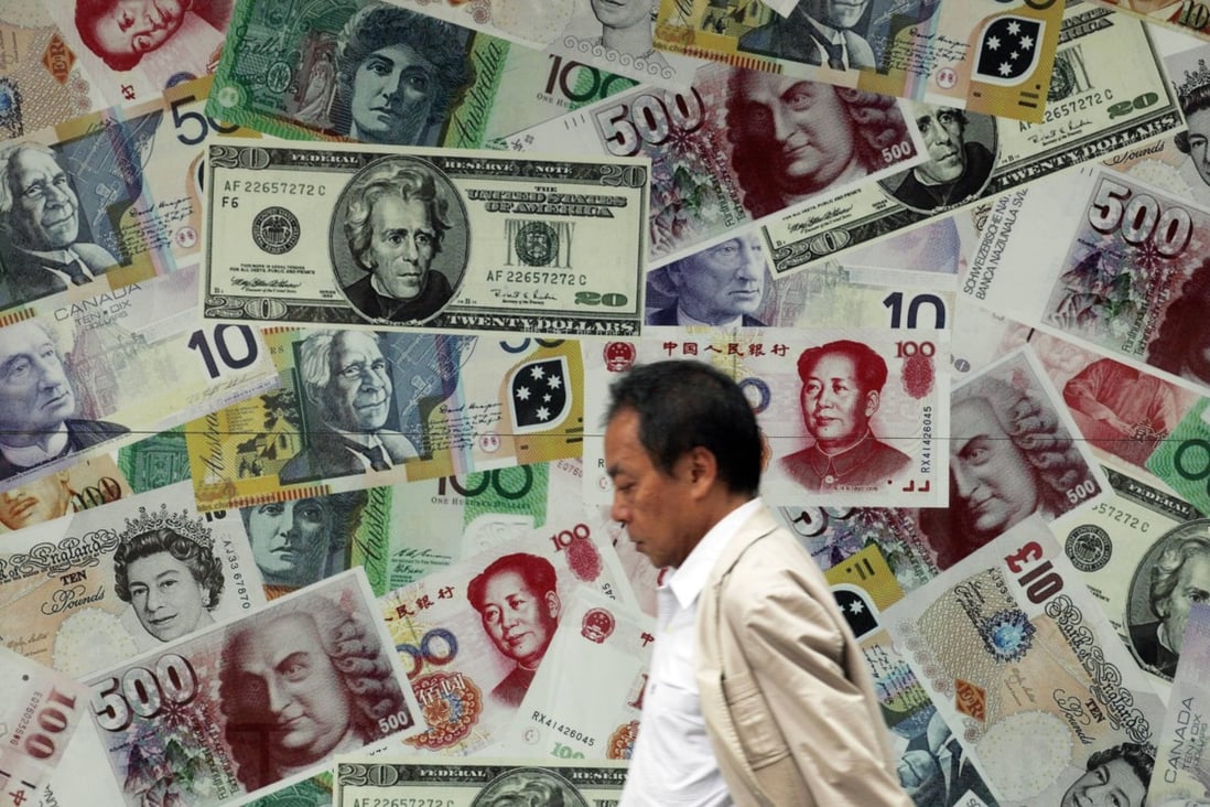 An advertisement promoting China's renminbi (RMB), US dollars and euros at a money changer in Hong Kong on July 26, 2011. Photo: Reuters