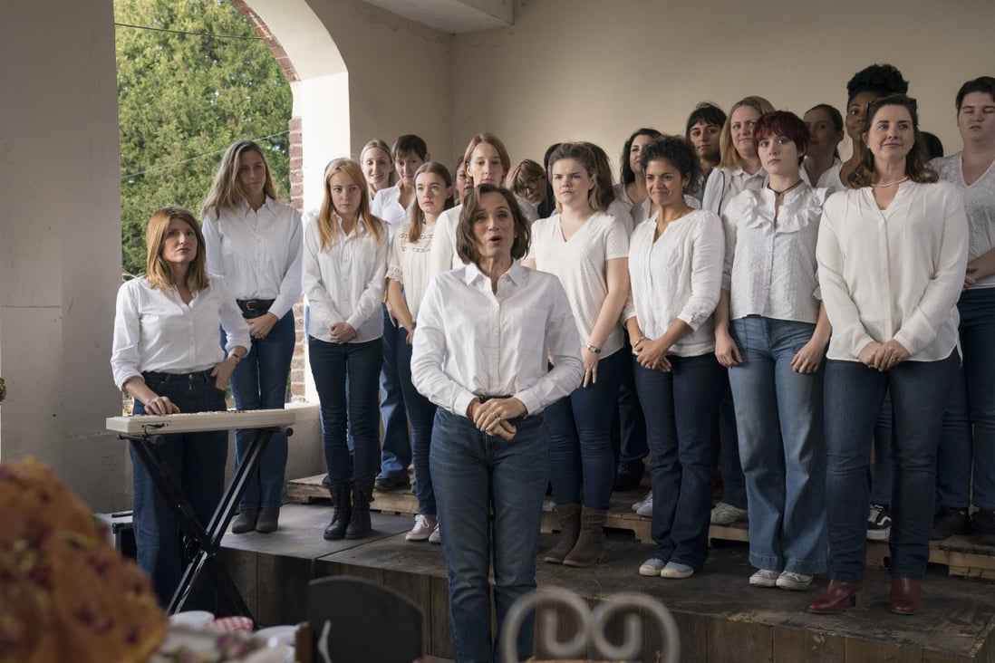 Kristin Scott Thomas (front) leads the choir in Military Wives (category IIA), directed by Peter Cattaneo. Sharon Horgan and Emma Lowndes co-star.