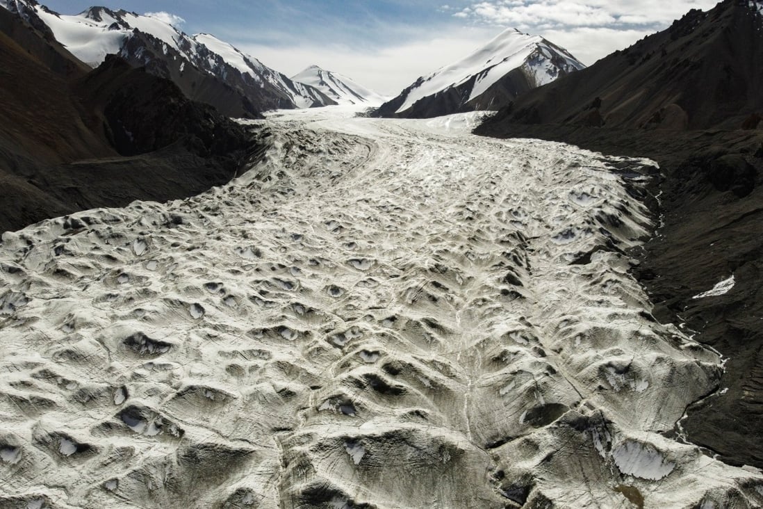 Melt water flows over the Laohugou No 12 glacier in Subei Mongol Autonomous County in Gansu province, China, in September 2020. Glaciers in China's bleak, rugged Qilian mountains are disappearing at a shocking rate, scientists say. Photo: Reuters