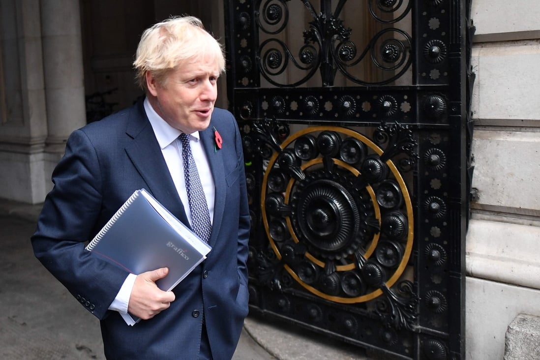 Britain's Prime Minister Boris Johnson arrives back at Downing Street in London on Tuesday. Photo: AFP