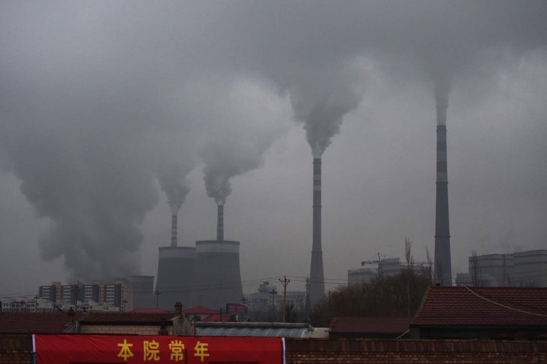 Smoke belches from a coal-fueled power station in China’s northern Shanxi province in 2015. Xi Jinping's vow to snuff out emissions by 2060 has moved China to the heart of the global green agenda. Photo: AFP