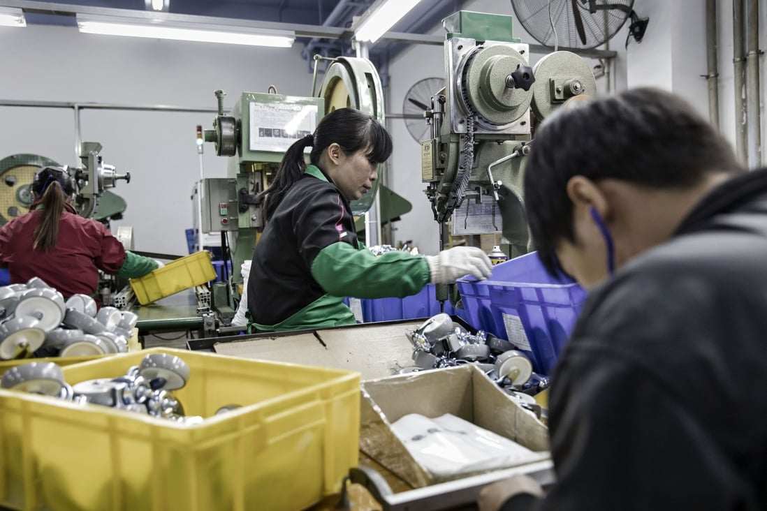 Factory workers in China’s manufacturing hub of Guangdong province are busy cranking out household items, which are increasingly in high demand across Europe and in the United States. Photo: Bloomberg