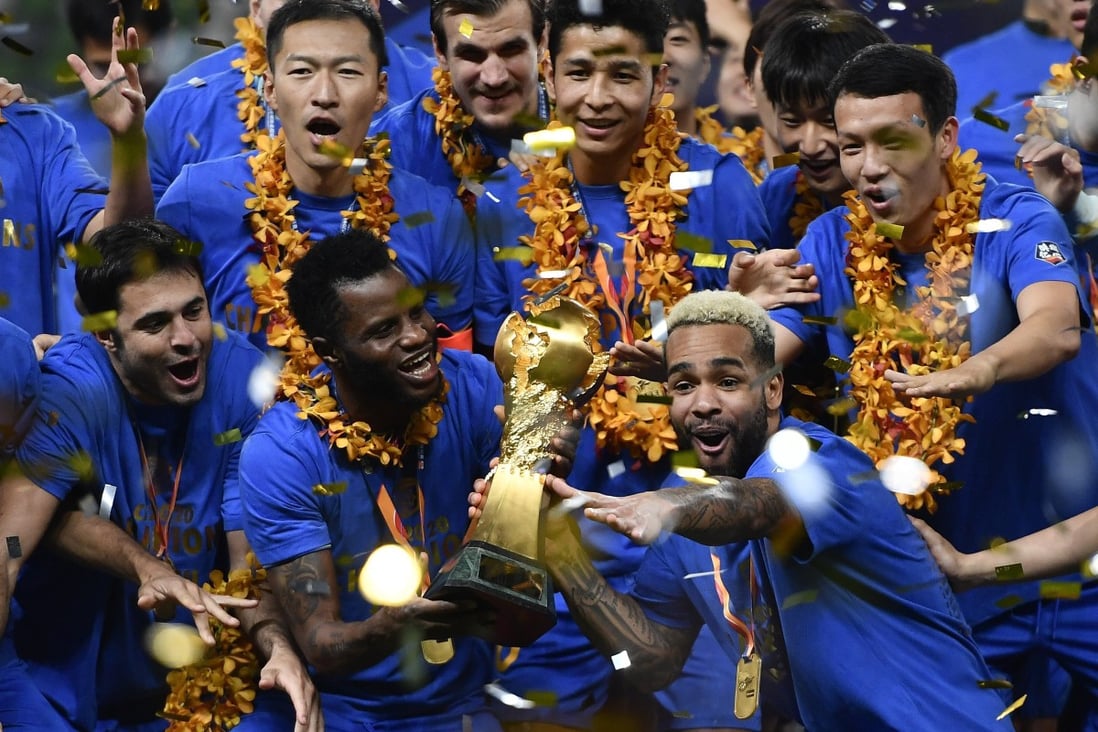 Jiangsu Suning’s Alex Teixeira starred as they claimed a first Chinese Super League title with a win over Guangzhou Evergrande. Photos: Xinhua
