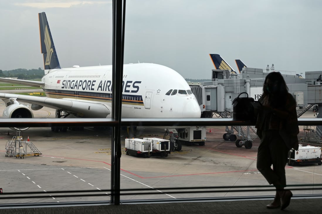 A Singapore Airlines Airbus A380 sits parked on the tarmac at Changi International Airport in Singapore on October 24. From November 22, Singapore and Hong Kong will launch quarantine-free travel between the two places. Photo: AFP