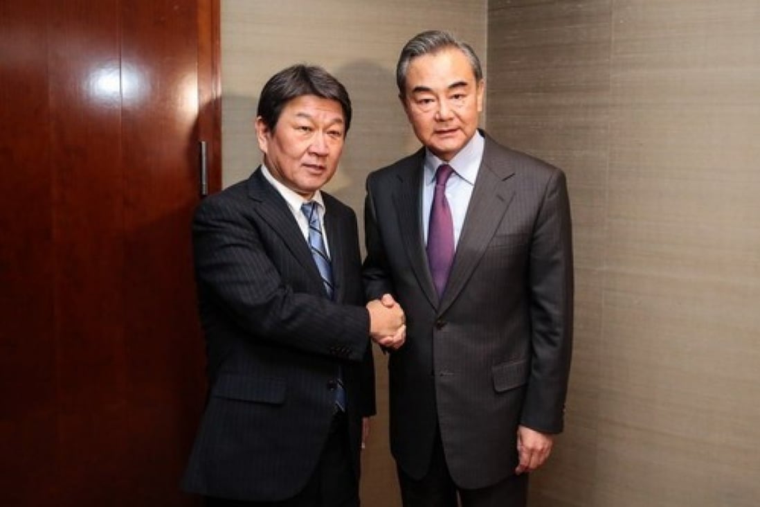 China’s Foreign Minister Wang Yi (right) may visit Tokyo to meet his Japanese counterpart Toshimitsu Motegi (left) later this month. Photo: Handout