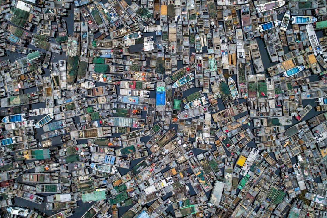 Fishing boats wait to be dismantled at Hongze Lake in Jiangsu province on November 3. The local authorities announced a ban on fishing in the lake to protect its biological resources. Photo: Zuma Wire/dpa