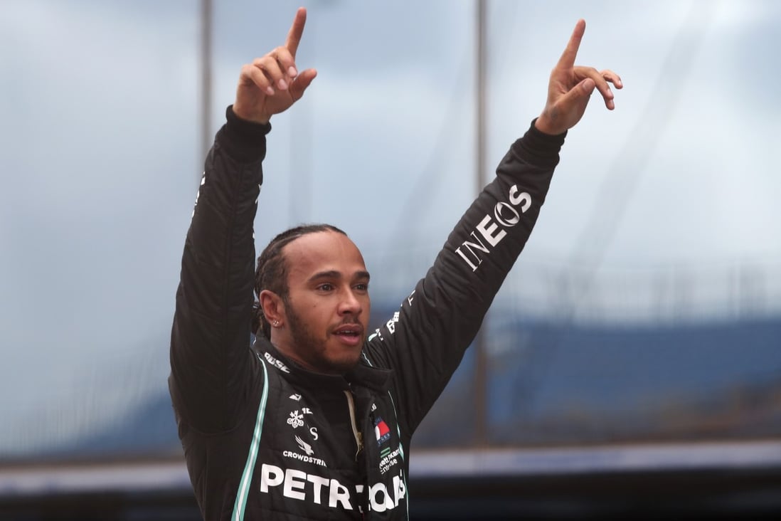 Mercedes driver Lewis Hamilton of Britain reacts after winning the Formula One Turkish Grand Prix at the Istanbul Park circuit racetrack in Istanbul. Photo: AP