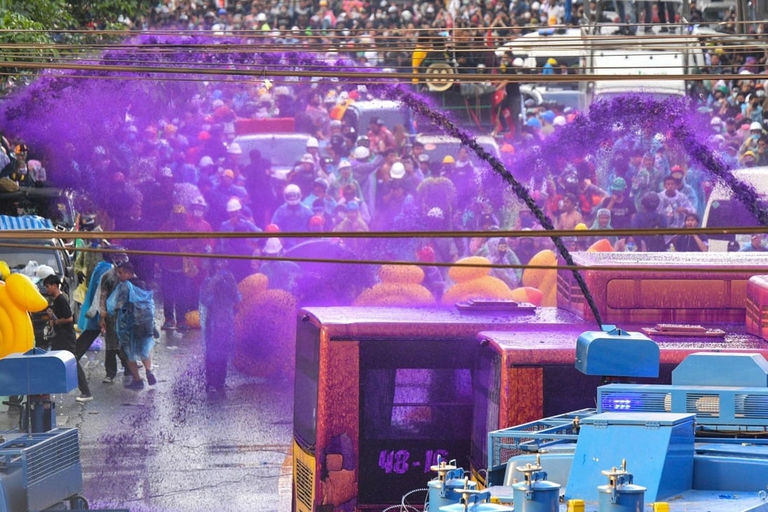 Thai police use water cannons, tear gas on protesters as parliament debates  changes to constitution | South China Morning Post