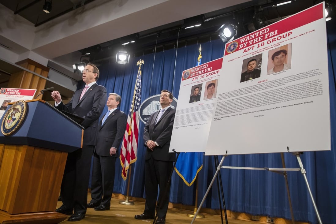 US Justice Department and FBI officials announce charges in December 2018 against two suspected computer hackers associated with the Chinese Ministry of State Security. Photo: EPA-EFE
