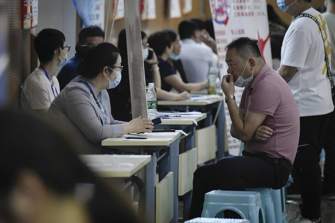 In October, the surveyed jobless rate was 5.3 per cent, down from 5.4 per cent in September, according to the National Bureau of Statistics (NBS). Photo: AFP