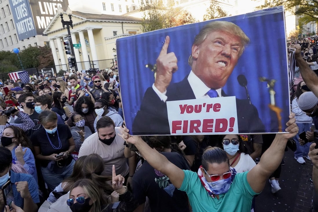 People gather to celebrate Joe Biden’s election win over US President Donald Trump on November 7 in Washington. Photo: AP