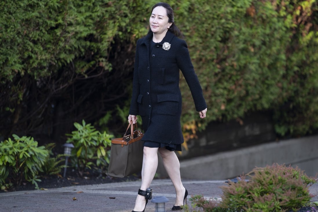 Huawei executive Meng Wanzhou leaves her home on Thursday for a British Columbia Supreme Court hearing on her extradition case. Photo: The Canadian Press via AP