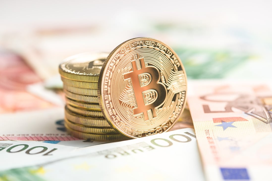 The golden bitcoin. Cryptocurrency and euro currency. Photo: Shutterstock
