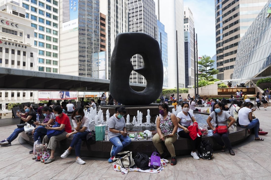 Foreign domestic helpers gather outside Exchange Square in Central, Hong Kong, on Sunday, August 9. The recent trend to vilify historical figures associated with slavery distracts us from redressing abuses today that continue to victimise migrant workers. Photo: Robert Ng