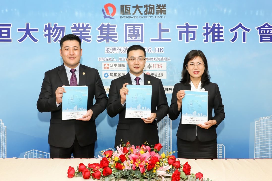Evergrande Property Services’ executive directors Wang Zhen (left), Hu Liang (centre) and An Lihong at a press conference to announce the launch of the company’s IPO. Photo: Handout
