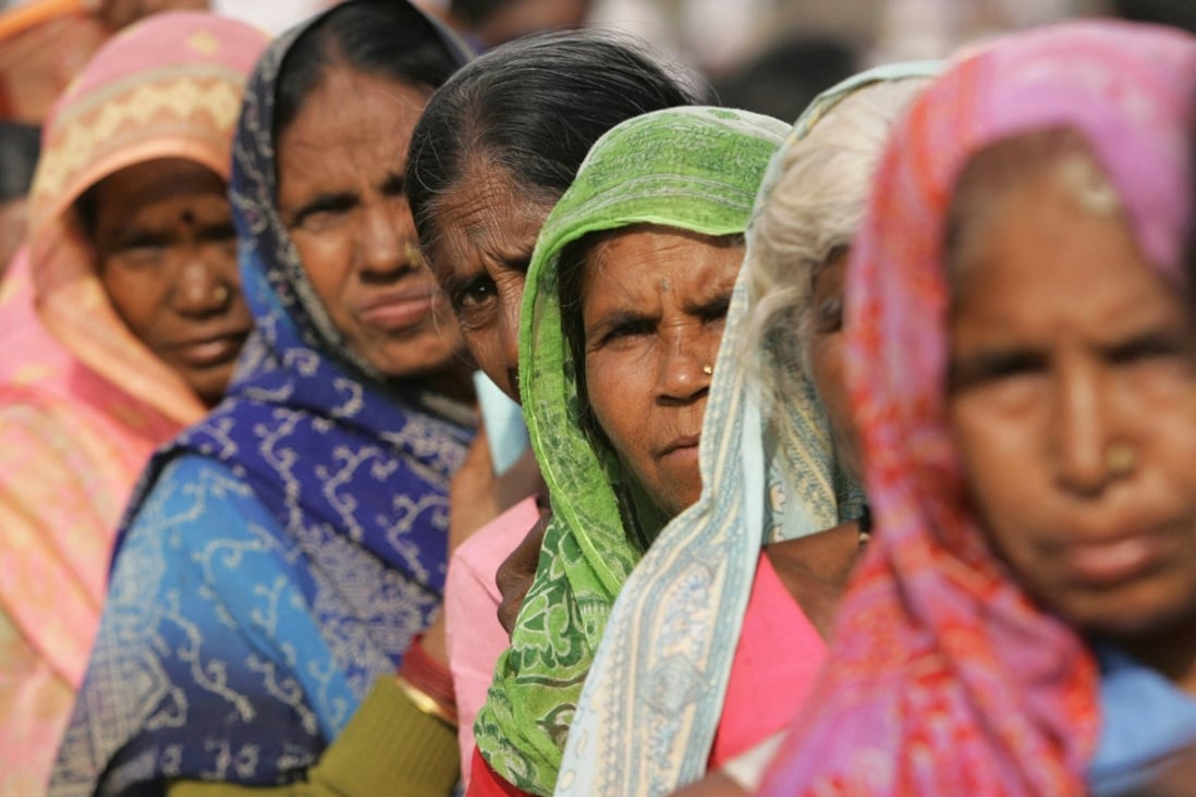 Lower-caste Dalit women wait for medical treatment in Mumbai in this 2006 file photo. Photo: AFP
