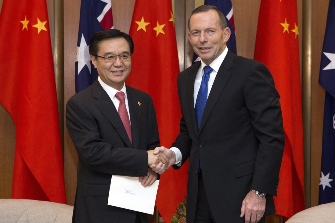 Then China Commerce Minister Gao Hucheng and then Australian Prime Minister Tony Abbott formalised the China-Australia Free Trade Agreement (ChAfta) in June 2015. Photo: Getty Images