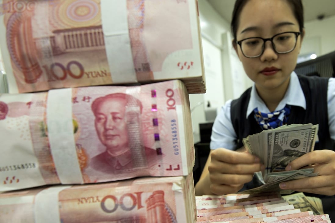 A lower yuan exchange rate figure means it takes fewer yuan to purchase one US dollar, indicating a stronger Chinese currency. Photo: AP
