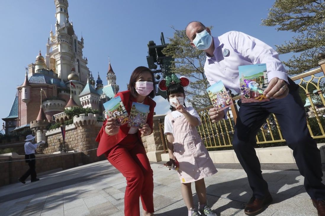 Disney’s vice-president, communications and public affairs Anita Lai (left) and senior vice-president, operations Tim Sypko (right) with 4-year-old Jessica Wong from J Life Foundation. Photo: Jonathan Wong