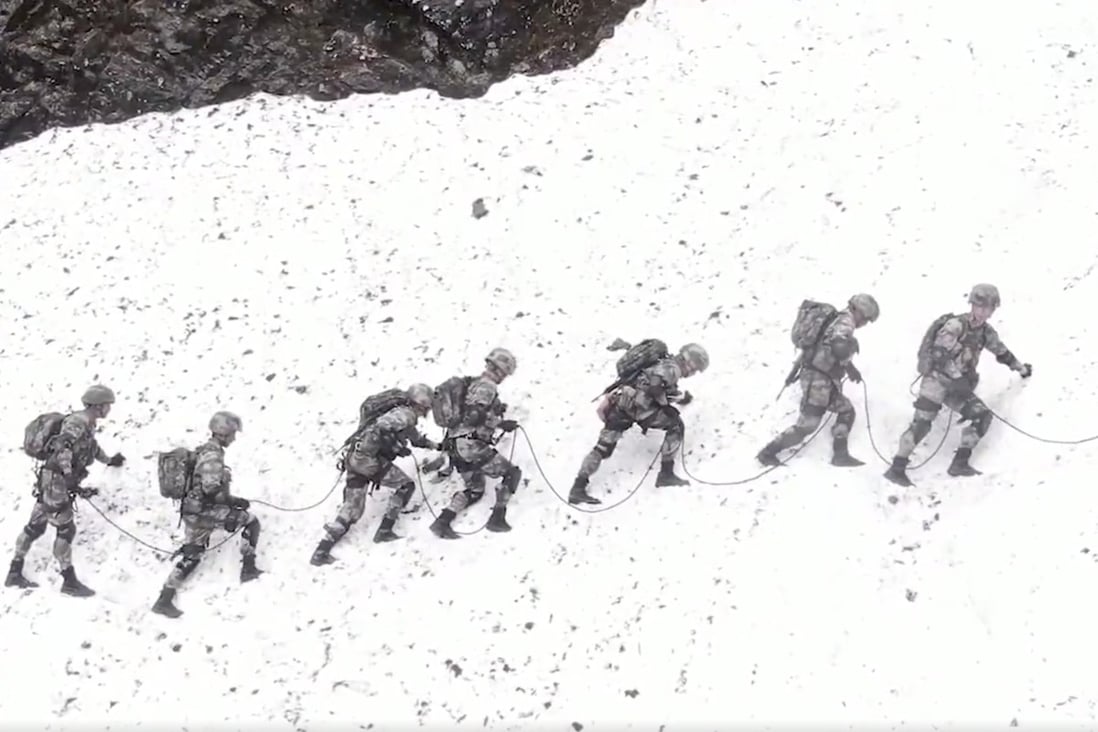 Footage of PLA troops trekking in the Nyenchen Tanglha mountain range was aired on Chinese state television on Tuesday. Photo: Weibo
