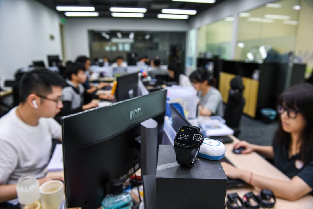 Employees work at a start-up company at the Guangdong, Hong Kong and Macau youth innovation and entrepreneurial base in Shenzhen on August 12. A new scheme announced by the Hong Kong government could draw more local youth to cities in the Greater Bay Area. Photo: Xinhua