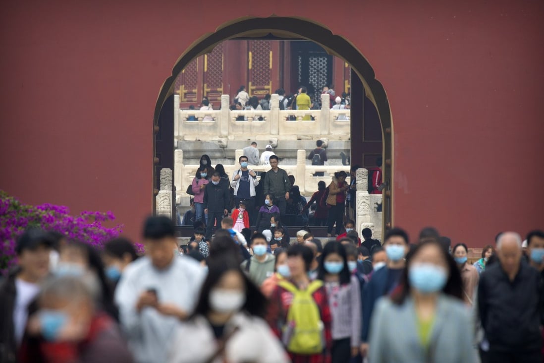 Visitors throng the Temple of Heaven in Beijing on October 1. Photo: AP