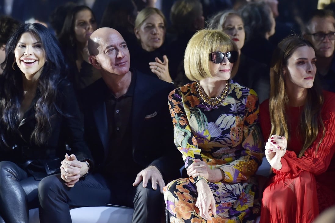 Jeff Bezos (centre left) and Anna Wintour (centre right) at a Tom Ford runway show in February 2020. Amazon founder Bezos is trying to crack the fashion luxury business. Photo: Getty Images