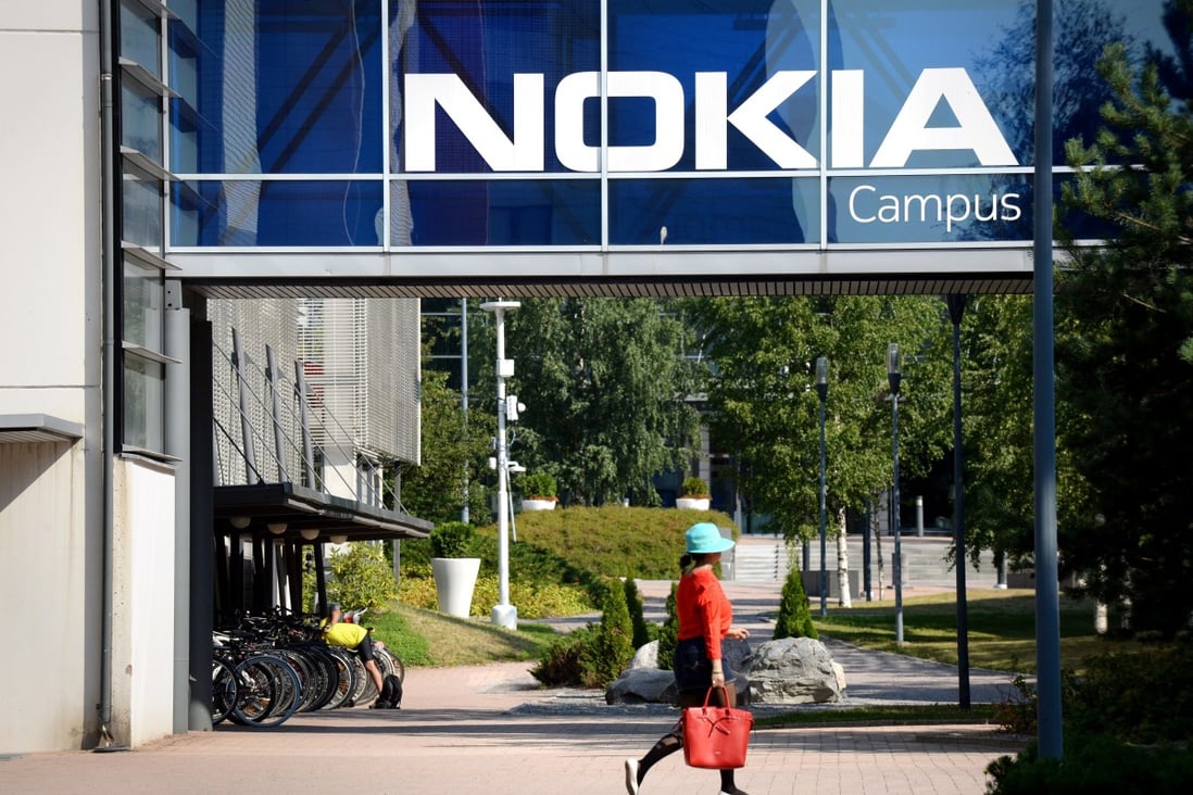 A woman walks at the headquarters of telecommunications equipment maker Nokia in Espoo, Finland. Nokia chief executive Pekka Lundmark said in October that China remains an important market for its 5G equipment. Photo: AP