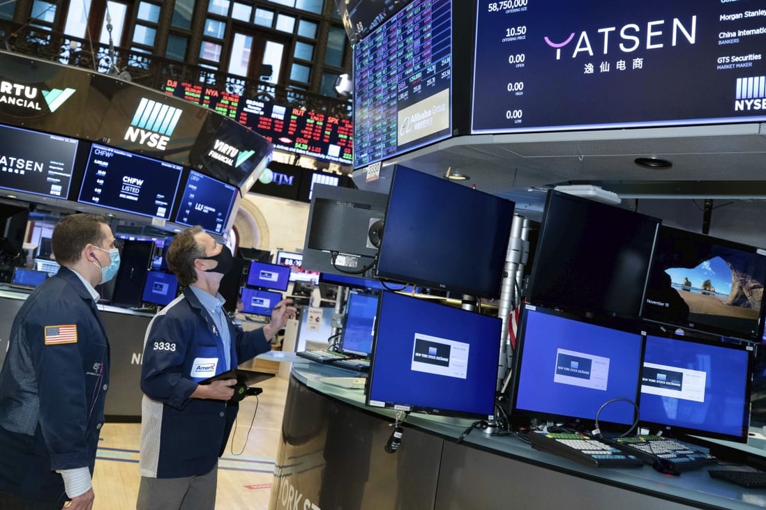 Traders work the floor of the New York Stock Exchange during the IPO of Chinese cosmetics company Yatsen Holding Ltd on November 19. Photo: NYSE via AP
