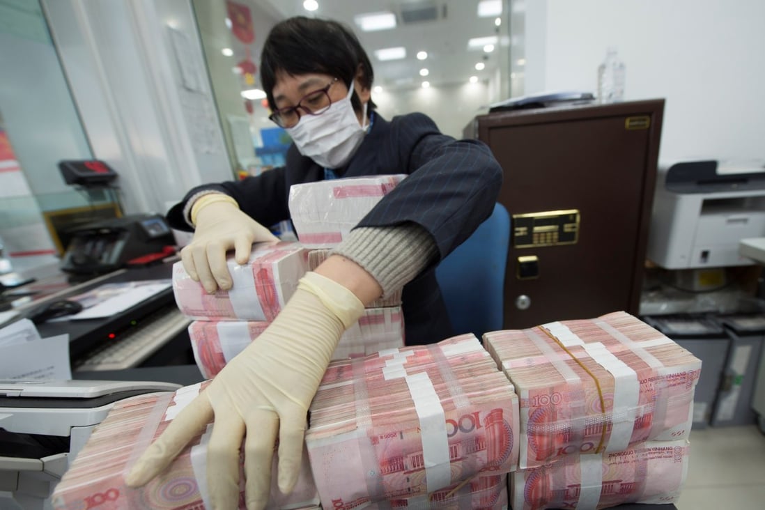 China’s shadow banking sector was estimated to be worth about 84.8 trillion yuan (US$12.9 trillion) in 2019. Photo: Reuters