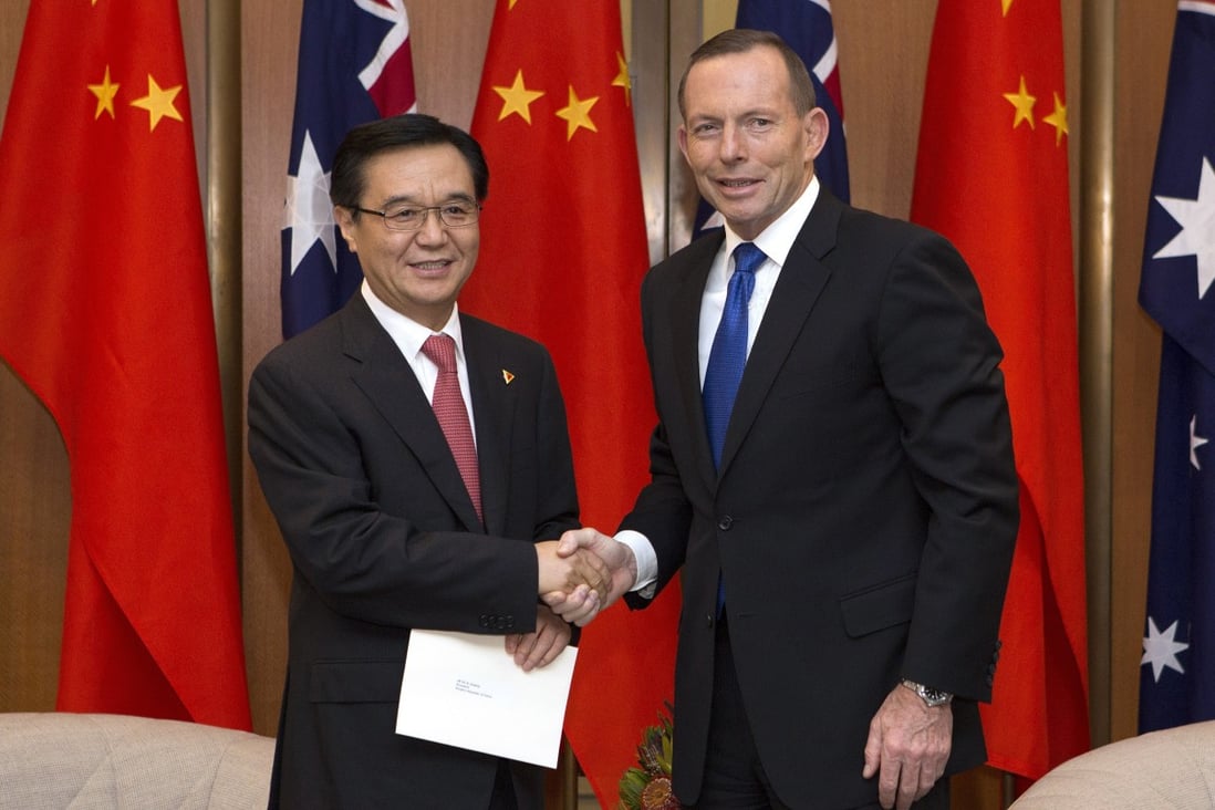 China’s former commerce minister, Gao Hucheng, and Australia’s former prime minister, Tony Abbott, formalised the China-Australia Free Trade Agreement (ChAfta) in June 2015. Photo: Getty Images