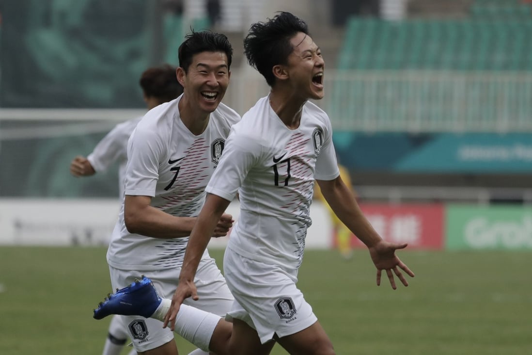 South Korea’s Lee Seung-woo celebrates his goal with Son Heung-min after scoring against Vietnam in the semi-finals at the 2018 Asian Games. Photo: AP