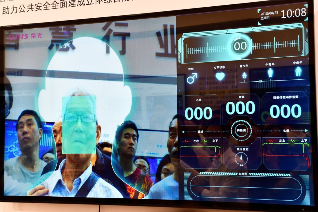 A facial recognition system developed by Tsinghua Unigroup at the first Smart China Expo in Chongqing on August 23, 2018. Unigroup defaulted on a US$450 million keepwell-backed bond. Photo: Reuters