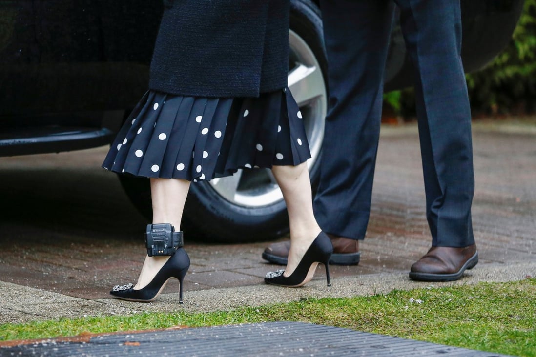 Huawei chief financial officer Meng Wanzhou wears an ankle monitor as she leaves home for an extradition hearing in Vancouver on January 20. Meng was arrested at Vancouver airport on a US warrant while changing planes in December 2018. The US wants her extradited to face fraud charges. Photo: Reuters