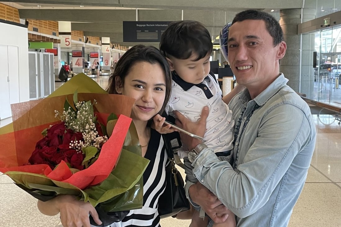Sadam Abudusalamu pictured with his wife Nadila Wumaier and three-year-old son Lufty at Sydney airport in Australia. Photo: Twitter